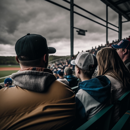 Parents cheering on at baseball game