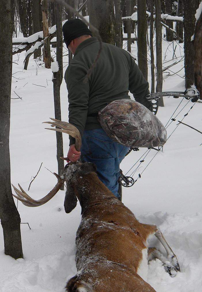 IWOM Hunting Suit in Fanny pack mode. | Whitetail Deer drag  | Realtree Camo