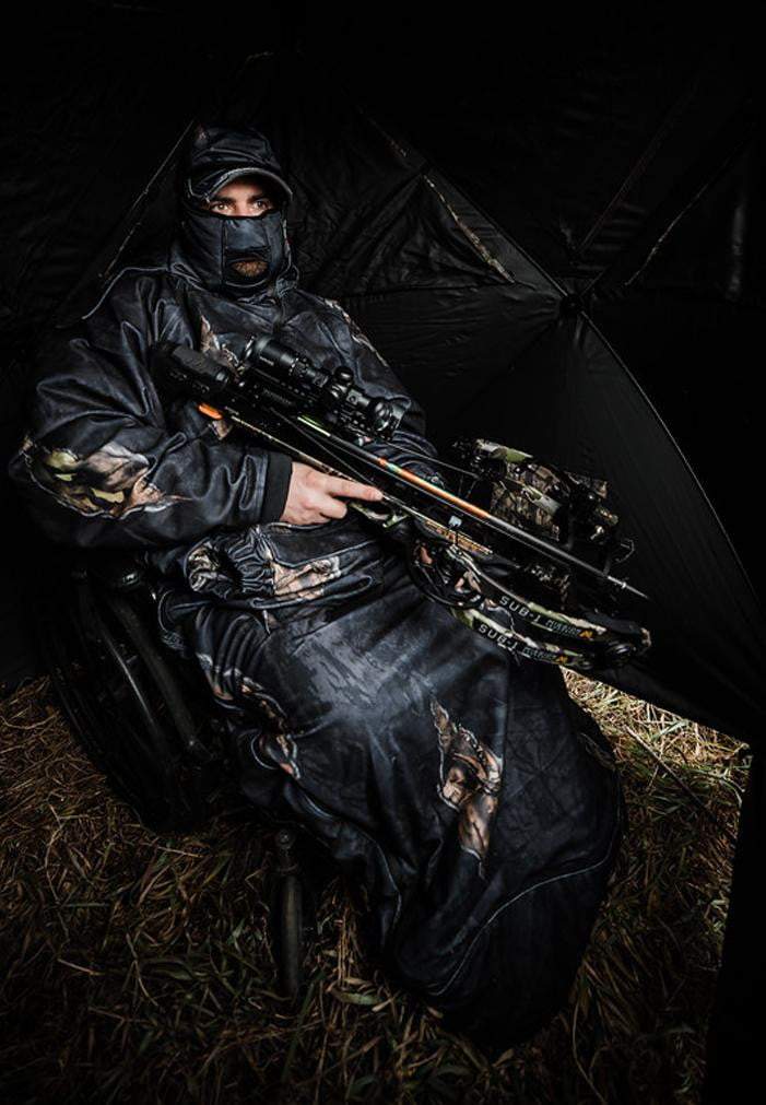 IWOM Adaptive Hunting Jacket for Wheel Chair Users hunting in blind with crossbow