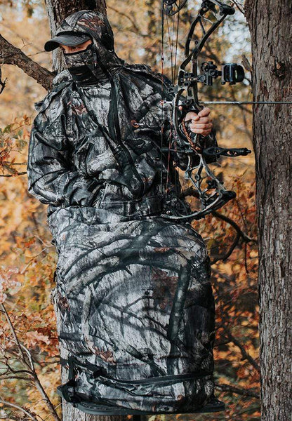 IWOM Hunting Suit | Mossy Oak Treestand Camo | Bow Hunter in Treestand | Insulated Hunting Clothes